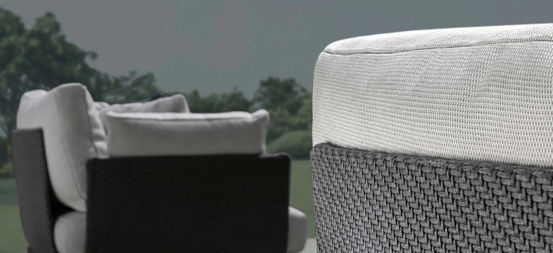 A Talenti Leaf armchair on a terrace at dusk